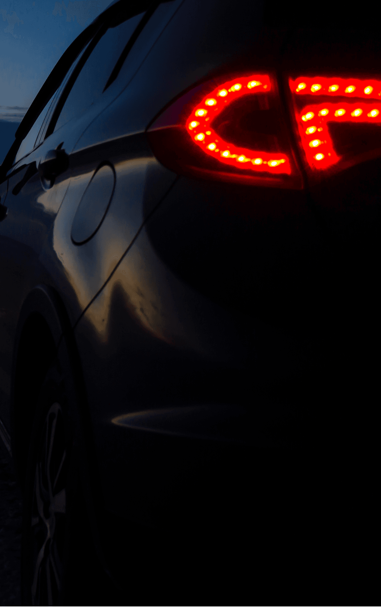 Luxury car with dramatic lighting