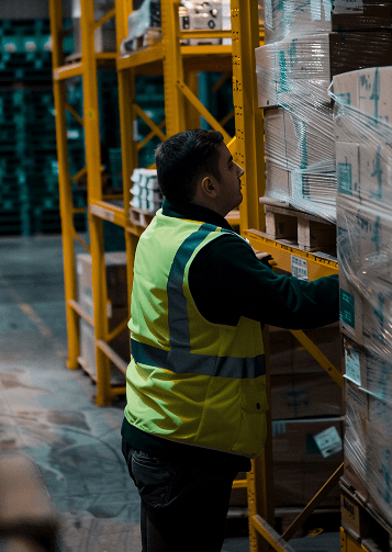 Industrial worker in safety vest promoting sustainability practices