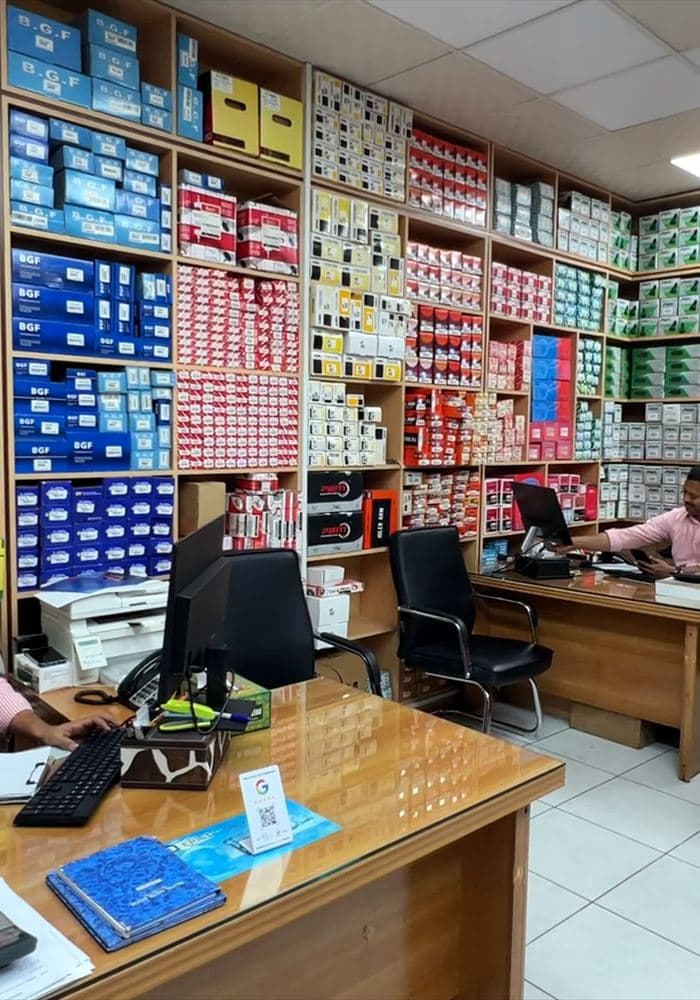 Speedway team serving customers from a fully stocked parts showroom